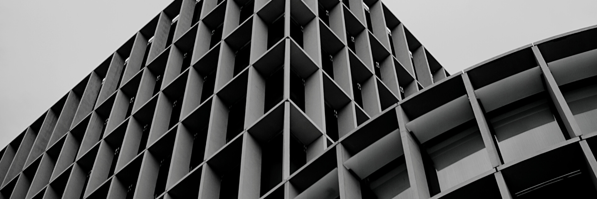 a landscape black and white photo of a corporate building